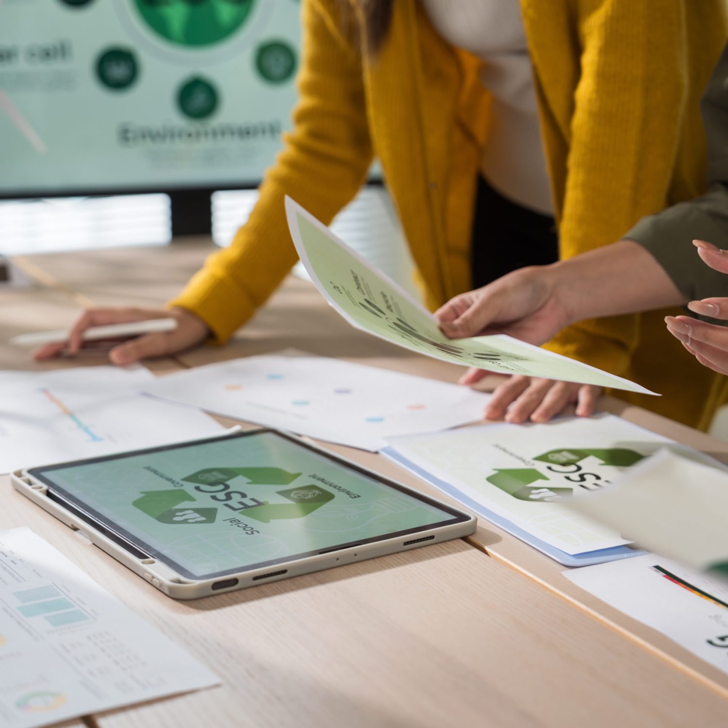 Asian business leaders meet to strategize on implementing sustainable practices, focusing on reuse, recycling, and environmental protection for a greener future